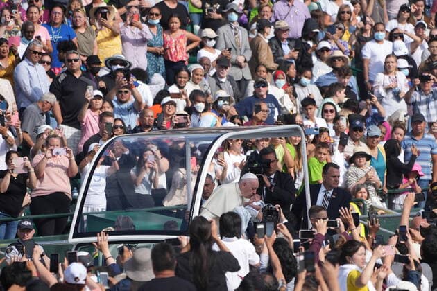 July 26, 2022, Edmonton, AB, CANADA: Pope Francis kisses a baby as he arrives at Commonwealth Stadium in Edmonton to take part in a public mass, Tuesday, July 26, 2022. Edmonton CANADA  - ZUMAc35_ 20220726_zaf_c35_003 Copyright: xNathanxDenettex