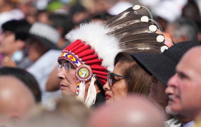 July 26, 2022, Edmonton, AB, CANADA: An Indigenous man takes part in a public mass held by Pope Francis at Commonwealth Stadium in Edmonton, Tuesday, July 26, 2022. Edmonton CANADA  - ZUMAc35_ 20220726_zaf_c35_020 Copyright: xNathanxDenettex