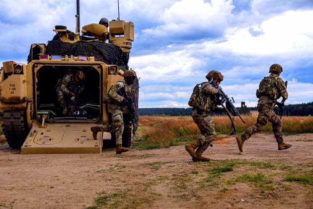 July 6, 2022 - Drawsko Pomorskie, Poland - U.S. Soldiers assigned to Chaos Company, 1st Battalion, 68th Armor Regiment, 3rd Armored Brigade Combat Team, 4th Infantry Division, dismount an M2A3 Bradley Fighting Vehicle during a live-fire exercise at Drawsko Pomorskie, Poland, July 6, 2022. The 3rd Armored Brigade Combat Team, 4th Infantry Division is among other units assigned to the 1st Infantry Division, proudly working alongside NATO allies and regional security partners to provide combat-credible forces to V Corps, America s forward deployed corps in Europe. Drawsko Pomorskie Poland - ZUMAz03_ 20220706_stw_z03_731 Copyright: xU.S.xArmyx