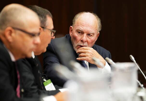 July 27, 2022, Ottawa, Ontario, CAN: Ontario Hockey League Commissioner David Branch, right, talks to Ligue de Hockey Junior Majeur du Quo bec Commissioner Gilles Courteau, middle as they appear as a witnesses at the standing committee on Canadian Heritage in Ottawa on Wednesday, July 27, 2022, looking into how Hockey Canada handled allegations of sexual assault and a subsequent lawsuit. Ottawa CAN - ZUMAc35_ 20220727_zaf_c35_068 Copyright: xSeanxKilpatrickx