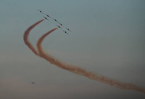 July 27, 2022, VANCOUVER, BC, CANADA: The Canadian Forces Snowbirds air demonstration team fly over English Bay as part of the Celebration of Light fireworks festival, in Vancouver, as an aircraft on approach to land at Vancouver International Airport is seen in the distance, on Wednesday, July 27, 2022. VANCOUVER CANADA  - ZUMAc35_ 20220727_zaf_c35_199 Copyright: xDarrylxDyckx