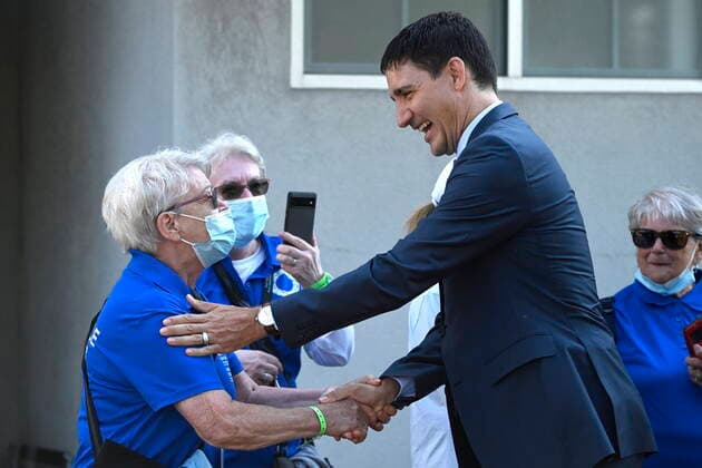 July 28, 2022, QUEBEC, QC, CANADA: Prime Minister Justin Trudeau greets volunteers at the Basilica of Sainte-Anne de Beaupro , east of Quebec City, during the papal visit of Pope Francis on Thursday, July 28, 2022. QUEBEC CANADA  - ZUMAc35_ 20220728_zaf_c35_023 Copyright: xBernardxBraultx