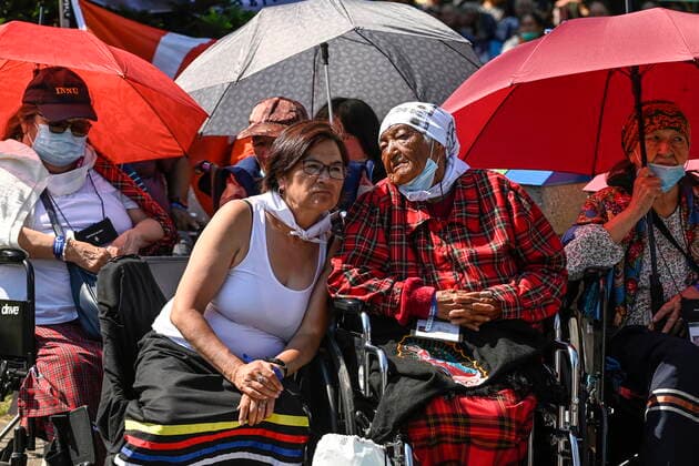 July 28, 2022, QUEBEC, QC, CANADA: Spectators watch the holy mass given by Pope Francis outside the Basilica of Sainte-Anne de Beaupro , east of Quebec City, Thursday, July 28, 2022. QUEBEC CANADA  - ZUMAc35_ 20220728_zaf_c35_031 Copyright: xBernardxBraultx