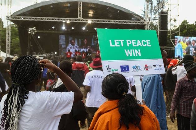 July 30, 2022, Nakuru, Rift Valley, Kenya: A participant holds a placard saying let peace win during a peace concert held to preach peace and harmony ahead of Kenya s August General Election. Kenyans will be going to the polls to choose their preferred president and members of both the national and county assemblies. Nakuru Kenya - ZUMAs197 20220730_zaa_s197_030 Copyright: xJamesxWakibiax