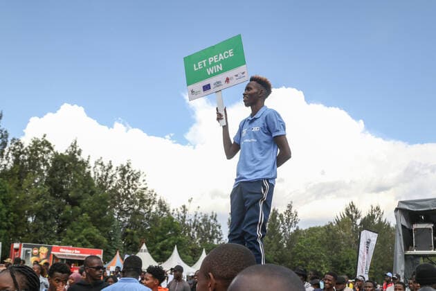 July 30, 2022, Nakuru, Rift Valley, Kenya: A participant holds a placard that says let peace win during a peace concert held to preach peace and harmony ahead of Kenya s August General Election. Kenyans will be going to the polls to choose their preferred president and members of both the national and county assemblies. Nakuru Kenya - ZUMAs197 20220730_zaa_s197_031 Copyright: xJamesxWakibiax