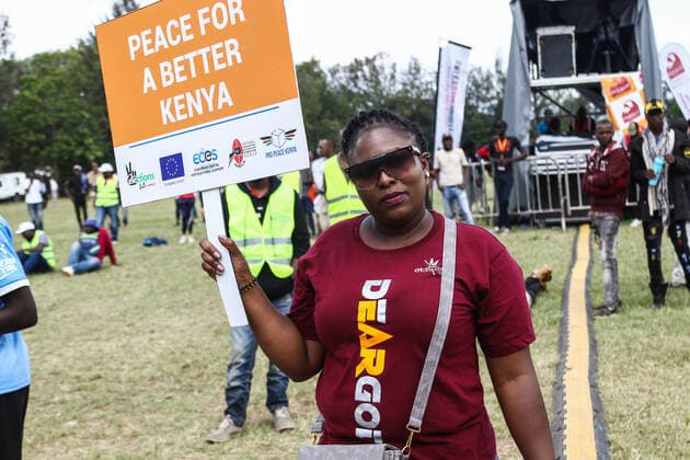 July 30, 2022, Nakuru, Rift Valley, Kenya: Tezzian Kiingati holds a placard saying Peace for a better Kenya during a peace concert held to reach peace and harmony ahead of Kenya s August General Election. Kenyans will be going to the polls to choose their preferred president and members of both the national and county assemblies. Nakuru Kenya - ZUMAs197 20220730_zaa_s197_038 Copyright: xJamesxWakibiax