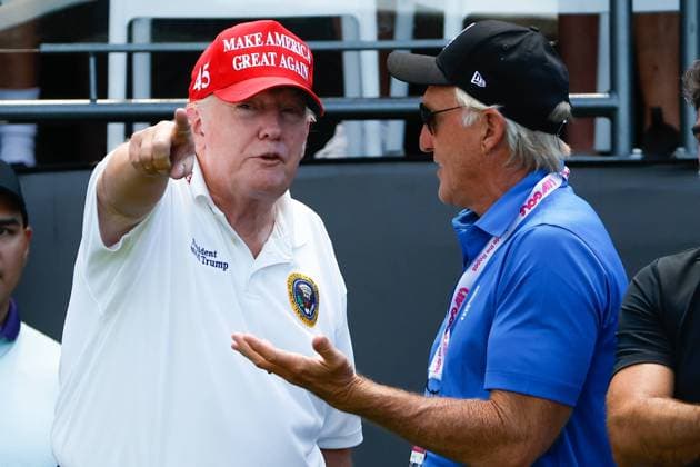 BEDMINSTER, NJ - JULY 30: Former President Donald Trump and LIV Golf CEO Commissioner Greg Norman at the 1st tee prior to the start of the second round of LIV golf invitational series on July 30, 2022 in Bedminster, New Jersey. (Photo by Rich Graessle Icon Sportswire) Icon1013521726
