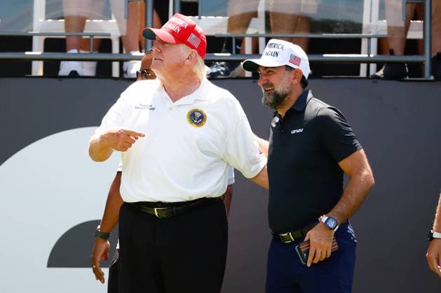 BEDMINSTER, NJ - JULY 30: Former President Donald Trump and Yasir Al-Rumayyan, Governor of the Public Investment Fund (PIF) the Sovereign wealth fund of the Kingdom of Saudi Arabia at the 1st tee prior to the start of the second round of LIV golf invitational series on July 30, 2022 in Bedminster, New Jersey. (Photo by Rich Graessle Icon Sportswire) Icon1013522199