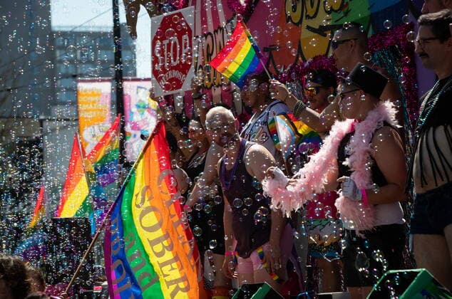July 31, 2022, VANCOUVER, BC, CANADA: Bubbles fill the air as people stand on a float while others march along side during the Vancouver Pride Parade, in Vancouver, on Sunday, July 31, 2022. VANCOUVER CANADA  - ZUMAc35_ 20220731_zaf_c35_045 Copyright: xDarrylxDyckx