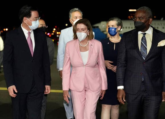 August 2, 2022, Taipei, Taipei, Taiwan: US House Speak Nancy Pelosi (M) with her delegation arrives in Taiwan as she is welcomed by Taiwan Foreign Minister Joseph Wu (L) at Taipei Songshan International Airport, despite serious objections over the visit from China which sees Taiwan, a self-ruled democracy, as its sovereignty. Taipei Taiwan - ZUMAh165 20220802_zih_h165_001 Copyright: xHandoutx xTaiwanxForeignxMinistrx
