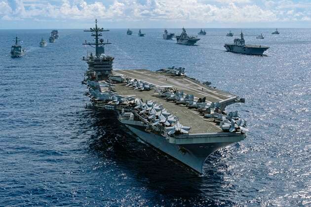 July 30, 2022 - Pacific Ocean - The Nimitz-class aircraft carrier USS Abraham Lincoln (CVN 72) are underway in formation during Rim of the Pacific (RIMPAC) 2022, July 28, 2022. Twenty-six nations, 38 ships, three submarines, more than 30 unmanned systems, approximately 170 aircraft and 25,000 personnel are participating in RIMPAC from June 29 to Aug. 4 in and around the Hawaiian Islands and Southern California. The world™s largest international maritime exercise, RIMPAC provides a unique training opportunity while fostering and sustaining cooperative relationships among participants critical to ensuring the safety of sea lanes and security on the world™s oceans. RIMPAC 2022 is the 28th exercise in the series that began in 1971. Pacif - ZUMAz03_ 20220730_stw_z03_923 Copyright: xCanadianxArmedxForcesx