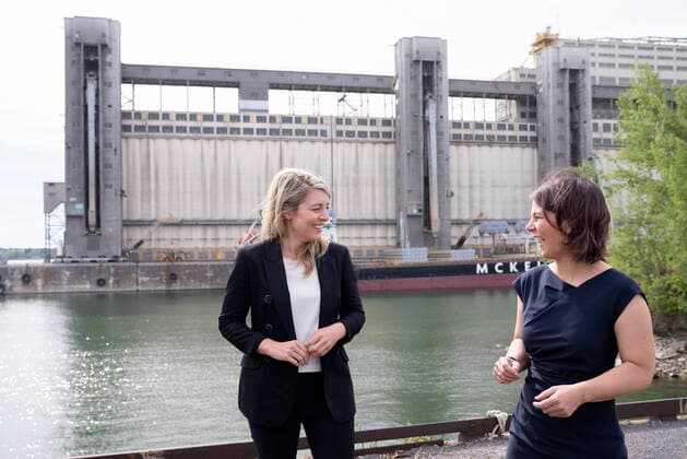 August 3, 2022, Montreal, PQ, Canada: Foreign Affairs Minister Melanie Joly and her German counterpart Federal Foreign Minister Annalena Baerbock share a laugh as they tour the Port of Montreal on Wednesday, August 3, 2022. Montreal Canada  - ZUMAc35_ 20220803_zaf_c35_016 Copyright: xPaulxChiassonx