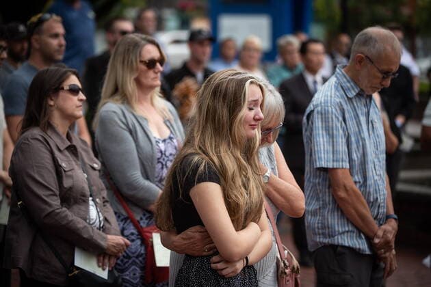 August 3, 2022, LANGLEY, BC, CANADA: Steven Furness daughter Lilee, 14, is comforted by her grandmother Lorraine Furness, back centre, as she cries during a vigil for her father and Paul Wynn, who were killed by a gunman during a series of attacks on homeless people last month, in Langley, B.C., on Wednesday, August 3, 2022. The suspect believed to be responsible for the shooting of four people, including the two fatalities, was shot and killed by the RCMP. LANGLEY CANADA - ZUMAc35_ 20220803_zaf_c35_084 Copyright: xDarrylxDyckx