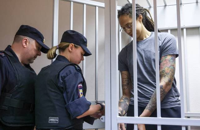 MOSCOW REGION, RUSSIA - AUGUST 4, 2022: US Olympic basketball champion Brittney Griner (R) who is on trial on drug smuggling charges, appears for a hearing at the Khimki Municipal Court in the town of Khimki, northeast of Moscow. Griner was placed into custody till December 20 over an alleged attempt to smuggle cannabis oil into Russia through Sheremetyevo Airport. Anton Novoderezhkin TASS  TS13CEE7