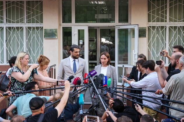 MOSCOW REGION, RUSSIA - AUGUST 4, 2022: Lawyers Alexander Boikov and Maria Blagovolina (L-R center) give comments to the media after the verdict announcement to US Olympic basketball champion Brittney Griner at the Khimki Municipal Court in the town of Khimki, northeast of Moscow. Griner has been found guilty of smuggling and possession of drugs and sentenced to nine years in prison. Anton Novoderezhkin TASS  TS13CFC0