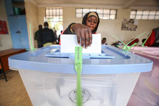 August 9, 2022, Nairobi, Kenya: A Kenyan woman casts her vote during the general elections. On 9 August 2022, Kenyans voted to elect the president and deputy president, county Governors, members of the Senate, representatives of the National Assembly (including women county representatives) and members of County Assemblies. This year, voting was held across an estimated 46,232 polling stations. Voting started at 6am and ended at 5pm. On 9 August 2022, Kenyans voted to elect the next president and deputy president, county Governors, members of the Senate, representatives of the National Assembly (including women county representatives) and members of County Assemblies. This year, voting was held across an estimated 46,232 polling stations. V - ZUMAs197 20220809_zaa_s197_263 Copyright: xBonifacexMuthonix