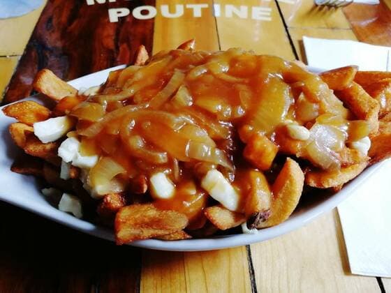canadian montreal poutine fried potatoes, cof, cof, 08.11.2020, Copyright: xrobysevillex Panthermedia29007130.jpg