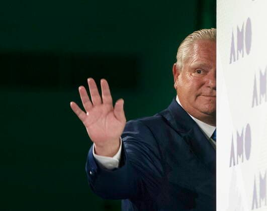 August 15, 2022, Ottawa, ON, Canada: Ontario Premier Doug Ford waves as he leaves the stage after delivering a speech at the Association of Municipalities Ontario conference, Monday, August 15, 2022 in Ottawa. Ottawa Canada  - ZUMAc35_ 20220815_zaf_c35_005 Copyright: xAdrianxWyldx