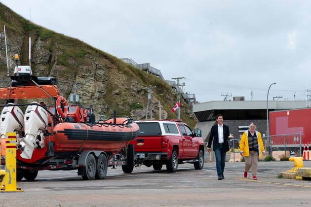 August 19, 2022, Žles-de-la-Madeleine, Que, Canada: Prime Minister Justin Trudeau is accompanied by Minister of National Revenue Diane Lebouthillier as he arrives to speak at Les ÃŽles-de-la-Madeleine, Que., Friday, Aug. 19, 2022. Îles-de-la-Madeleine Canada  - ZUMAc35_ 20220819_zaf_c35_010 Copyright: xNigelxQuinnx