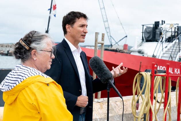 August 19, 2022, vÃ les-de-la-Madeleine, Que, Canada: Prime Minister Justin Trudeau is accompanied by Minister of National Revenue Diane Lebouthillier as he speaks at Les vÃ les-de-la-Madeleine, Que., Friday, Aug. 19, 2022. véles-de-la-Madeleine Canada  - ZUMAc35_ 20220819_zaf_c35_011 Copyright: xNigelxQuinnx