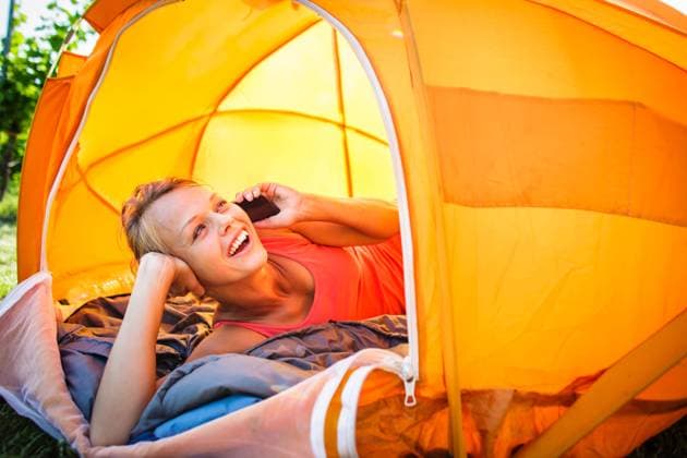 Pretty, young woman camping outdoors, lying in the tent in the morning, using her smart phone, model released, , 17068848.jpg, PHONE, Reach, activity, adult, alone, beautiful, camping, caucasian, cell, cellular, cheerful, communication, european, female, happiness, happy, holding, human, independent, indoors, istanbul, laying, leisure, lying, message, mobile, morning, nature, networking, office, one, park, people, person, recreation, relax, relaxation, resting, smile, spring, summer, technology, tent, using, vacation, woman, women, working, young, youth,