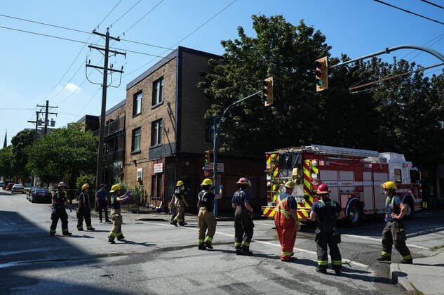 August 22, 2022, VANCOUVER, BC, CANADA: Firefighters are seen outside a building in the Downtown Eastside after extinguishing a fire sparked by an apparent explosion in Vancouver, on Monday, August 22, 2022. The cause of the explosion is not known but it blew out some windows before flames spread to the inside of two buildings, leaving dozens of people without a home. VANCOUVER CANADA  - ZUMAc35_ 20220822_zaf_c35_048 Copyright: xDarrylxDyckx