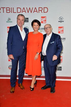 Clemens Toennies and his wife Margit and Reiner Calmund arriving at the SPORT BILD Award ceremony at the Fischauktionshalle in Hamburg on 22 08 2022