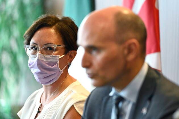 August 23, 2022, Ottawa, ON, CAN: Dr. Leigh Chapman, CanadaöÄÃ s Chief Nursing Officer, listens as Minister of Health Jean-Yves Duclos speaks during a news conference announcing her appointment and the reinstatement of the position, in Ottawa, on Tuesday, Aug. 23, 2022. Ottawa CAN - ZUMAc35_ 20220823_zaf_c35_017 Copyright: xJustinxTangx