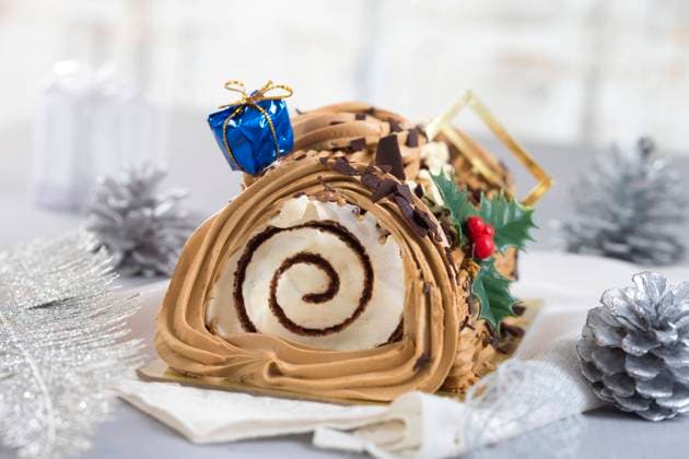 a yule log cake, traditional of christmas time , 19281670.jpg, Christmas, Shiny, Tradition, bright, buche, cake, celebrate, celebration, chocolate, coffe cream, confection, confectionery, cuisine, culinary, de, dessert, eating, festive, food, french, garland, gastronomy, genoise, golden, gourmet, horizontal, log, meal, new year, new years occasion, noel, ornament, ornamented, party, pastry, roll, season, seasonal, sponge, sweet, swiss, tinsel, traditional, typical, yule,