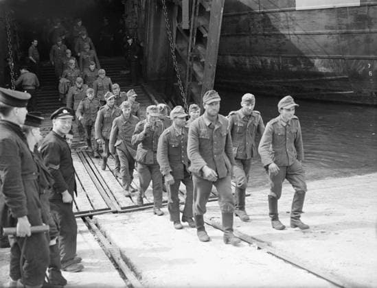The Royal Navy during the Second World War- Operation Overlord (the Normandy Landings), June 1944 Some of a party of three hundred German prisoners of war from Normandy leaving an LST at Southampton Docks. Copyright: xpiemagsx admiralww2pie10322-361 !ACHTUNG AUFNAHMEDATUM GESCHÄTZT!