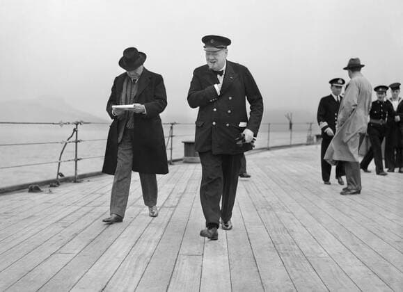 Winston Churchill and Lord Beaverbrook on HMS PRINCE OF WALES during the Atlantic Conference with President Roosevelt, August 1941. The Prime Minister, Winston Churchill, and Lord Beaverbrook leave HMS PRINCE OF WALES to say good-bye to President Roosevelt aboard USS AUGUSTA. This photograph was taken during a series of meetings between President Roosevelt and Prime Minister Churchill on board HMS PRINCE OF WALES and USS AUGUSTA in the North Atlantic off the coast of Newfoundland, 9 - 12 August 1941. Copyright: xpiemagsx admiralww2pie10322-4213 !ACHTUNG AUFNAHMEDATUM GESCHÄTZT!