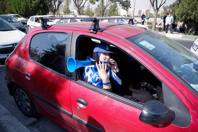 August 25, 2022, Tehran, Tehran, Iran: Female soccer fans prepare to attend a match between their team Esteghlal and Mes-e Kerman in Iran s Premier League at Azadi stadium in Tehran, Iran, Aug. 25, 2022. A limited number of Iranian women have been allowed into a stadium in Tehran to watch a league football match for the first time. Tehran Iran - ZUMAi98_ 20220825_zih_i98_001 Copyright: xRouzbehxFouladix