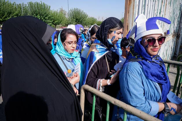 August 25, 2022, Tehran, Tehran, Iran: Female soccer fans prepare to attend a match between their team Esteghlal and Mes-e Kerman in Iran s Premier League at Azadi stadium in Tehran, Iran, Aug. 25, 2022. A limited number of Iranian women have been allowed into a stadium in Tehran to watch a league football match for the first time. Tehran Iran - ZUMAi98_ 20220825_zih_i98_008 Copyright: xRouzbehxFouladix