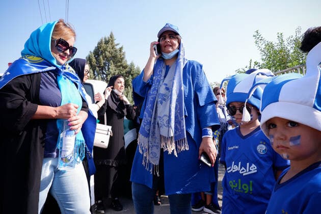 August 25, 2022, Tehran, Tehran, Iran: Female soccer fans prepare to attend a match between their team Esteghlal and Mes-e Kerman in Iran s Premier League at Azadi stadium in Tehran, Iran, Aug. 25, 2022. A limited number of Iranian women have been allowed into a stadium in Tehran to watch a league football match for the first time. Tehran Iran - ZUMAi98_ 20220825_zih_i98_012 Copyright: xRouzbehxFouladix