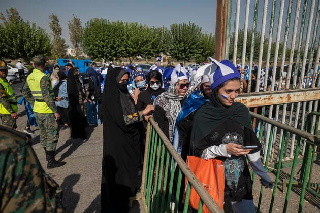 Iranian Women Allowed To Watch Football Match After FIFA Pressure As Iranian female soccer fans enter the Azadi (Freedom) stadium in western Tehran, members of the special police force monitor the area before a soccer match between Esteghlal F.C. and Mes Kerman, August 25, 2022. For the first time after the victory of the Iranian Islamic Revolution, 500 female football fans were allowed to enter the Azadi Stadium to watch the matches of the Iranian Premier League. Tehran Iran  Copyright: xMortezaxNikoubazlx originalFilename: nikoubazl-iransocc220825_npM2L.jpg