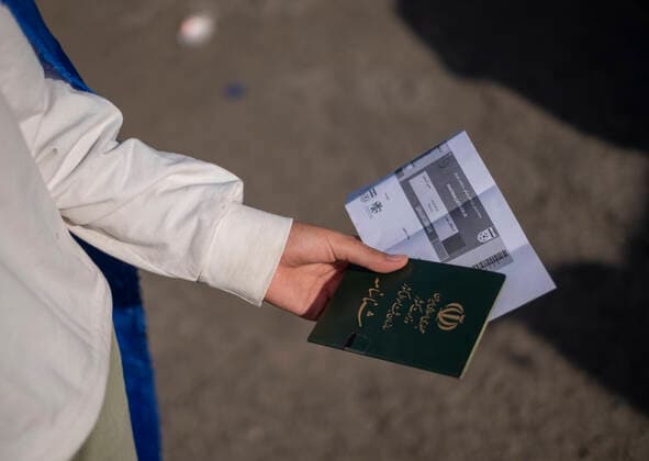 Iranian Women Allowed To Watch Football Match After FIFA Pressure An Iranian soccer female fan shows her Identification and a printed soccer ticket to the photographer while standing behind the eastern gate of the Azadi (Freedom) stadium in western Tehran for watching a soccer match between Esteghlal F.C. and Mes Kerman, August 25, 2022. For the first time after the victory of the Iranian Islamic Revolution, 500 female football fans were allowed to enter the Azadi Stadium to watch the matches of the Iranian Premier League. Tehran Iran  Copyright: xMortezaxNikoubazlx originalFilename: nikoubazl-iransocc220825_npQNt.jpg