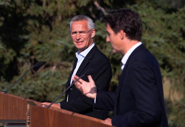 August 26, 2022, COLD LAKE, AB, CANADA: NATO Secretary General Jens Stoltenberg, left, and Prime Minister Justin Trudeau speak during a press conference at 4 Wing Cold Lake air base in Cold Lake Alta, on Friday August 26, 2022. COLD LAKE CANADA  - ZUMAc35_ 20220826_zaf_c35_010 Copyright: xJasonxFransonx