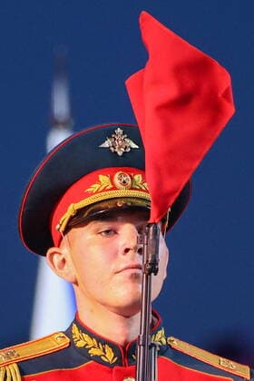 MOSCOW, RUSSIA - AUGUST 26, 2022: A serviceman of the 154th Preobrazhensky Independent Commandant s Regiment performs during an evening show as part of the opening of the Spasskaya Tower 2022 International Military Music Festival in Red Square. Sergei Bobylev TASS  TS13F785