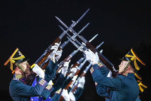 MOSCOW, RUSSIA - AUGUST 26, 2022: Russian Presidential Regiment honour guards perform during an evening show as part of the opening of the Spasskaya Tower 2022 International Military Music Festival in Red Square. Sergei Bobylev TASS  TS13F7A1