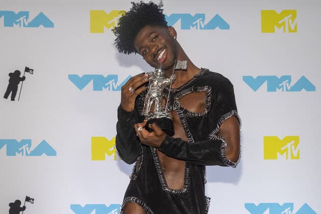 Lil Was X holds the Moon Person Award in the press room at the 2022 MTV Video Music Awards VMA s at the Prudential Center in Newark, NJ on Sunday, August 28th, 2022.  NYP20220828511 GabrielexHoltermann