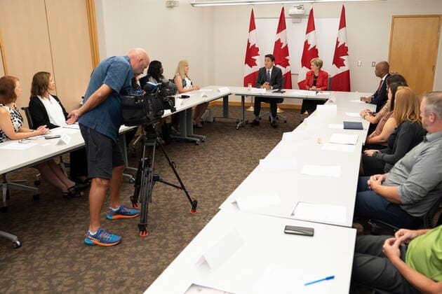 August 30, 2022, Kitchener, ON, Canada: Prime Minister Justin Trudeau, along with Karen Redman, Chair, Region of Waterloo and Ahmed Hussen, Minister of Housing, Diversity and Inclusion meets with participants in a housing roundtable at the Country Hills Library in Kitchener, Ont. on Tuesday, Aug. 30, 2022. Kitchener Canada - ZUMAc35_ 20220830_zaf_c35_014 Copyright: xPeterxPowerx