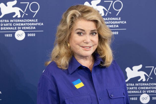 French actress Catherine Deneuve, wearing a flag of Ukraine on her shirt, poses on August 31, 2022, during a photocall for the Golden Lion for Lifetime Achievement she is to be awarded, on the opening day of the 79th Venice International Film Festival at Venice Lido. Ã‚ Photo: Cinzia Camela.  Copyright: xCinziaxCamelax xipa-agency.netx xLivexMediax