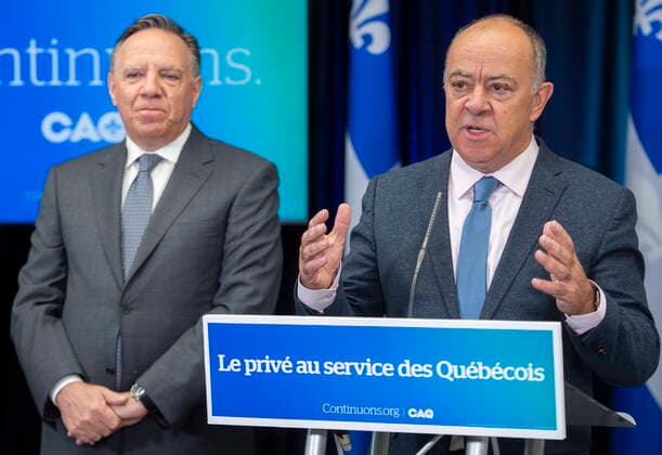 September 3, 2022, Montreal, PQ, Canada: Coalition Avenir Quebec Leader Francois Legault, left, looks on as Christian Dube, outgoing Quebec health minister and CAQ candidate speaks at a news conference during an election campaign stop in Montreal, Saturday, Sept. 3, 2022. Quebecers will go to the polls on October 3rd. Montreal Canada - ZUMAc35_ 20220903_zaf_c35_013 Copyright: xGrahamxHughesx