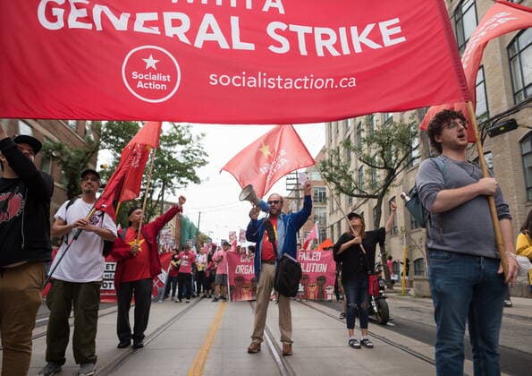 September 5, 2022, TORONTO, ON, CANADA: Participants chant as they march through Toronto during the Labour Day Parade on Monday, September 5, 2022. TORONTO CANADA  - ZUMAc35_ 20220905_zaf_c35_032 Copyright: xTijanaxMartinx
