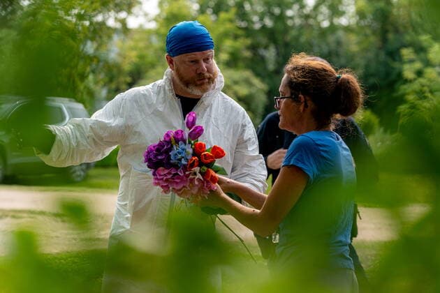 September 5, 2022, Weldon, SK, Canada: Ruby Works speaks with a forensic investigator before bringing flowers to the home of a victim who has been identified by residents as Wes Petterson in Weldon, Sask., on Monday, September 5, 2022. Works said that the 77-years-old victim was like an uncle to her. Saskatchewan RCMP say arrest warrants have been issued for two suspects in a deadly stabbing rampage who remain at large. Weldon Canada  - ZUMAc35_ 20220905_zaf_c35_051 Copyright: xHeywoodxYux
