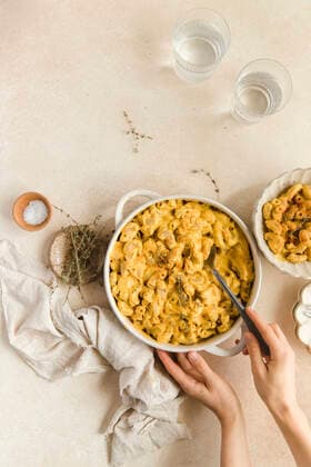 Mac n Cheese flat lay with hands Copyright: xMoriahxSawtellex MOS110121-68