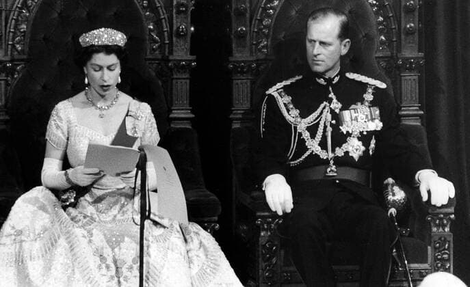 October 14, 1957, OTTAWA, ON, CANADA: Prince Philip listens attentively as Queen Elizabeth II reads the Speech from the Throne opening Parliament, in Ottawa, Oct. 14, 1957. THE CANADIAN PRESS OTTAWA CANADA  - ZUMAc35_ 19571014_zaf_c35_005 Copyright: xThexCanadianxPressx
