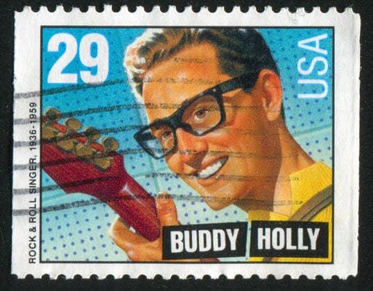 UNITED STATES - CIRCA 1993: stamp printed by United states, shows Buddy Holly, circa 1993 , 6208028.jpg, 1993, America, Buddy, Holly, Seal, USA, United States, adult, aged, ancient, antique, envelope, face, hair, head, historic, human, letter, mail, male, man, message, musician, old, people, person, philately, portrait, postage, postcard, postmark, retro, serious, stamp, state, states, united, us, vintage,