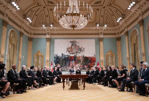 September 10, 2022, Ottawa, ON, CANADA: Members of Cabinet look on as Canadian Prime Minister Justin Trudeau and Governor General Mary Simon sign documents during an accession ceremony at Rideau Hall, in Ottawa, Saturday, Sept. 10, 2022. Ottawa CANADA  - ZUMAc35_ 20220910_zaf_c35_013 Copyright: xAdrianxWyldx