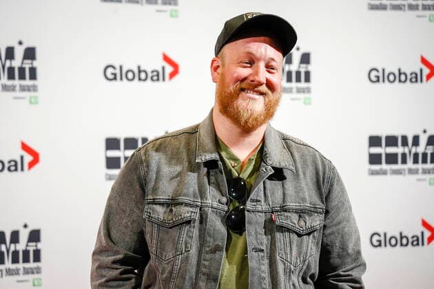 September 11, 2022, Calgary, AB, CANADA: Tyler Joe Miller poses on the red carpet at the Canadian Country Music Awards in Calgary, Alta., Sunday, Sept. 11, 2022. Calgary CANADA  - ZUMAc35_ 20220911_zaf_c35_329 Copyright: xJeffxMcintoshx